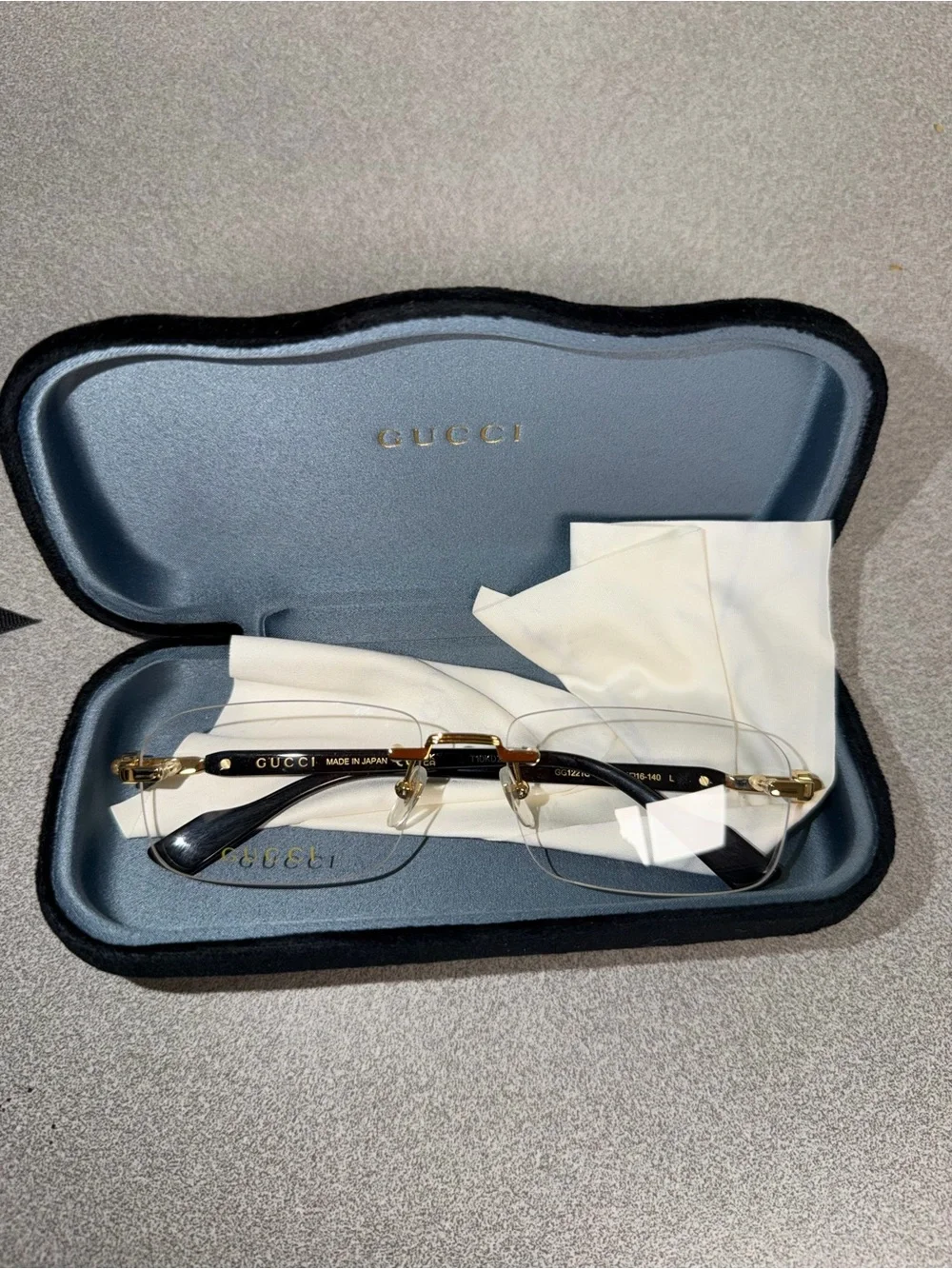 Gucci Men’s Rimless Eyeglasses Gold and Black Accents